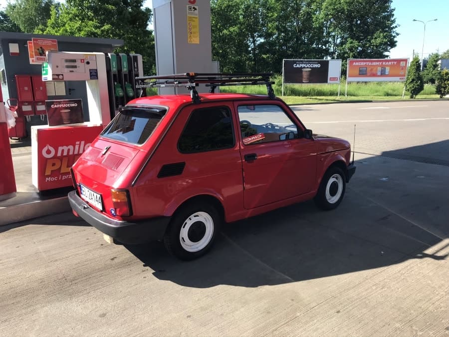 Maluch at a gas station